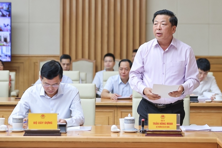 Bộ trưởng Bộ Xây dựng Trần Hồng Minh phát biểu tại hội nghị. Ảnh: VGP/Nhật Bắc