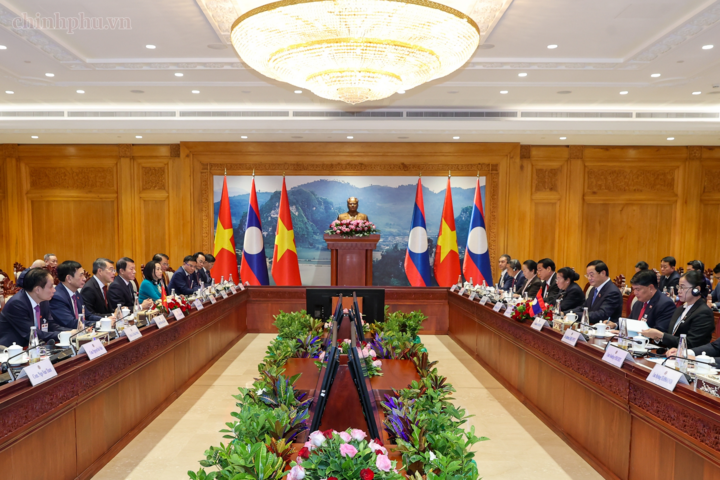 Thủ tướng Chính phủ Lê Minh Hưng hội kiến Chủ tịch Quốc hội Lào Sonexay Siphandone. Ảnh: chinhphu.vn/Nhật Bắc
